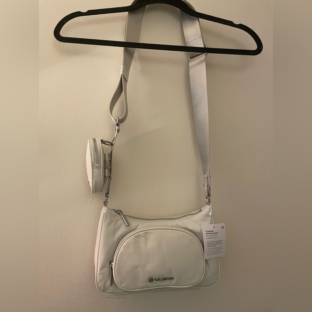 BNWT lululemon crossbody with nano pouch! Color is bone